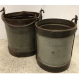 Two large galvanised and studded steel swing handled buckets largest 35 cm high
