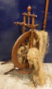A Victorian Swiss treen ware spinning wheel of typical form,
