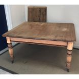 A Victorian oak rectangular extending dining table, the top with moulded edge and single extra leaf,