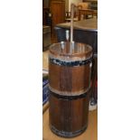A 20th Century coopered teak metal bound cylindrical stick stand, 26 cm diameter x 61.