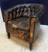 A 19th Century buttoned leather yoke back scroll arm chair on square tapered legs to casters 76 cm