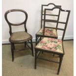 A set of three stained beech slat back kitchen chairs, two bar back bedroom chairs,