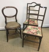 A set of three stained beech slat back kitchen chairs, two bar back bedroom chairs,