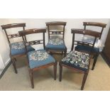 A set of five Victorian rosewood bar back dining chairs with drop-in seats on turned and reeded