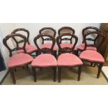A set of eight Lion House Antiques Victorian style mahogany dining chairs with upholstered seats on