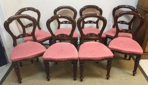 A set of eight Lion House Antiques Victorian style mahogany dining chairs with upholstered seats on