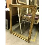 A gilt picture frame with acanthus,
