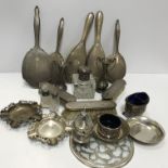 A collection of silver wares to include a silver backed dressing table set comprising hand mirror,
