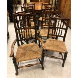 A 19th Century composite set of eight spindle back North Country dining chairs with rush seats (7