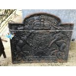 A cast iron fire back with Charles I coat of arms, bearing date 1635, 60 cm x 52 cm,
