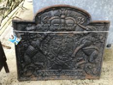 A cast iron fire back with Charles I coat of arms, bearing date 1635, 60 cm x 52 cm,