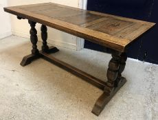 A 20th Century oak refectory style dining table in the 17th Century manner,