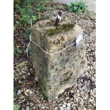 A staddle stone base,