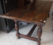 A 19th Century oak refectory style dining table,