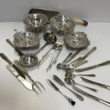 A collection of silver wares to include a pair of early 20th Century silver bonbon dishes with