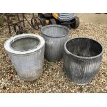 A collection of three various galvanised dolly buckets,