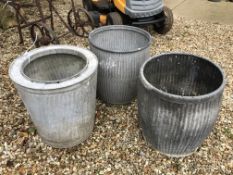 A collection of three various galvanised dolly buckets,