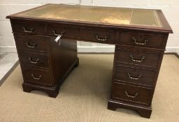 A modern mahogany double pedestal desk in the 19th Century manner,