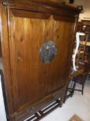 A Chinese cherrywood wedding cabinet,