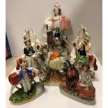 A collection of nine various 19th Century Staffordshire figures including hunter with rifle and