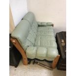 A mid 20th Century Norwegian Erkones teak framed pale green leather upholstered two seat sofa 137