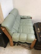 A mid 20th Century Norwegian Erkones teak framed pale green leather upholstered two seat sofa 137