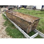 A cast iron trough with swing twin handles, the front inscribed "Stow-on-the-Wold",