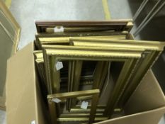 A large collection of 19th Century and later gilt and gesso and wooden picture frames of varying