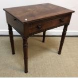 An early Victorian mahogany and rosewood strung reading table,