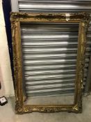 A gilt 19th Century picture frame with beaded decoration - internal aperture 52 cm x 104 cm and