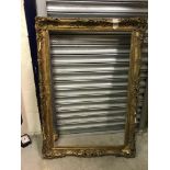 A gilt 19th Century picture frame with beaded decoration - internal aperture 52 cm x 104 cm and