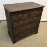 A late 18th Century North Country oak and cross-banded chest,