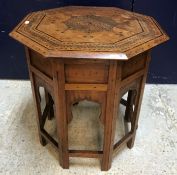 An early 20th Century Indian brass and inlaid octagonal occasional table by Kanhaya Lal Brij Lal