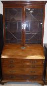 A late George III mahogany bureau bookcase,
