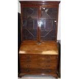 A late George III mahogany bureau bookcase,