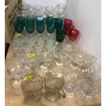A collection of various cut and other drinking glasses including a set of six champagne saucers,