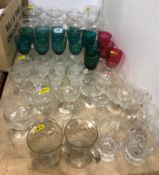 A collection of various cut and other drinking glasses including a set of six champagne saucers,