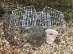 A vintage wrought iron hay rack,