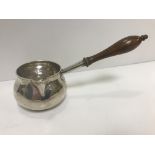 A George II silver brandy warmer (by Sarah Parr, London 1729), with turned mahogany handle,