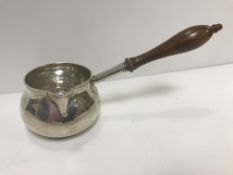 A George II silver brandy warmer (by Sarah Parr, London 1729), with turned mahogany handle,