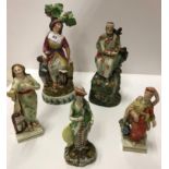 A collection of five early 19th Century Staffordshire pearl ware figures,