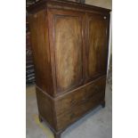 A 19th Century mahogany and rosewood strung linen press,