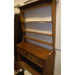 A 20th Century pitch pine dresser,