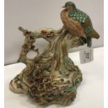 A 19th Century Meji period Japanese satsuma ware polychrome decorated figure of a pigeon (or poss.