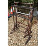 Three adjustable iron trestles