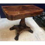 An early Victorian rosewood tea table,