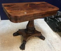 An early Victorian rosewood tea table,