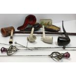 A vintage Meerschaum pipe, housed in a leather case depicting stylised claw,