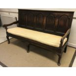 A 19th Century oak settle,