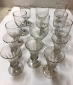 A collection of fourteen various 19th Century English drinking glasses including rummers,